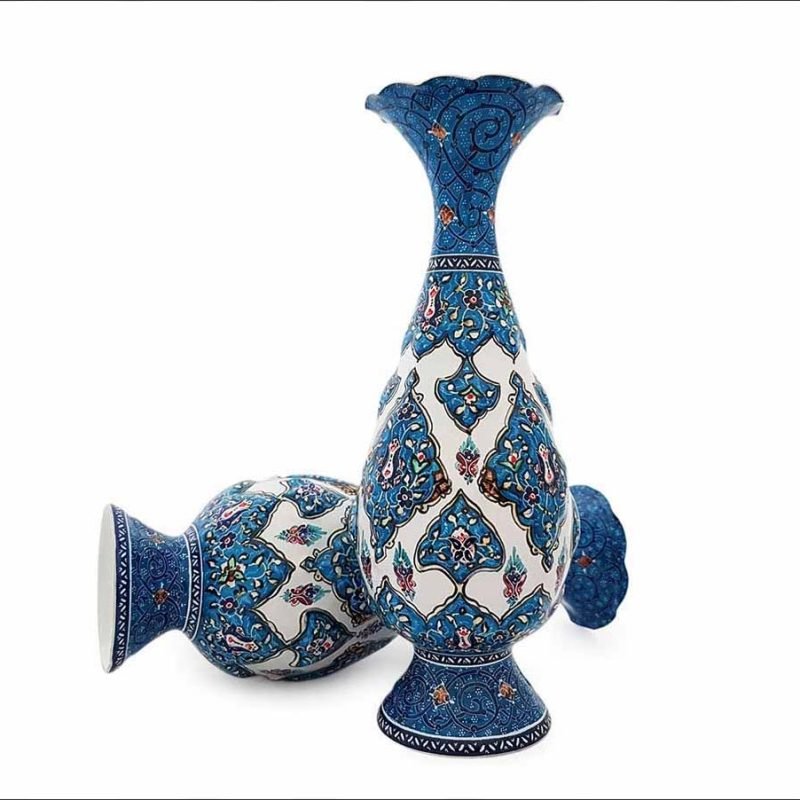 A meticulously crafted 20 cm Persian Enamel Vase, showcasing rich enamelling against a gleaming copper backdrop.
