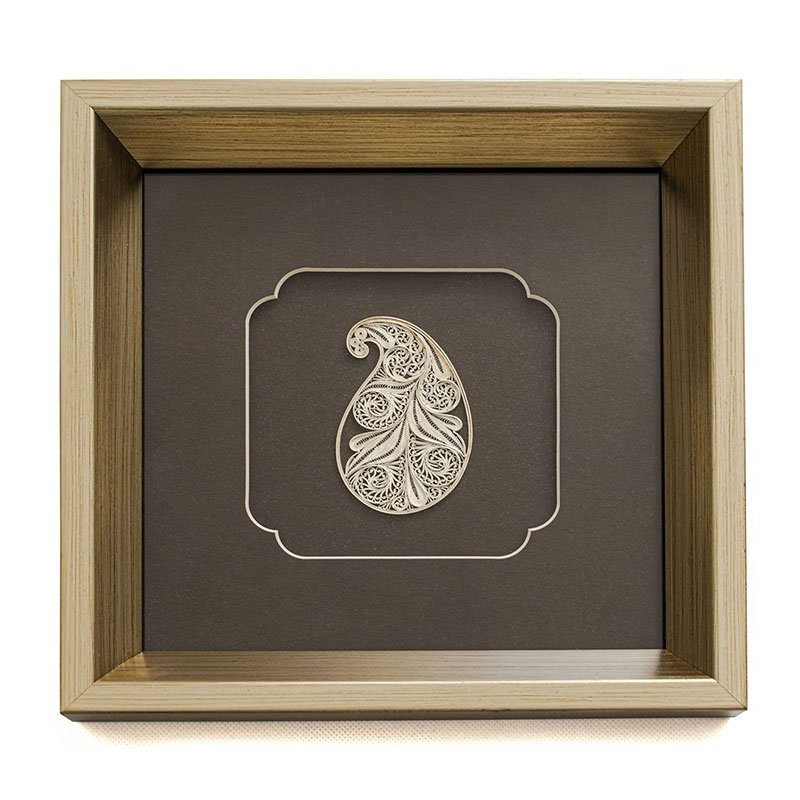 Image of the Persian filigree paisley wall art - sterling silver paisley within a protective glass layer.