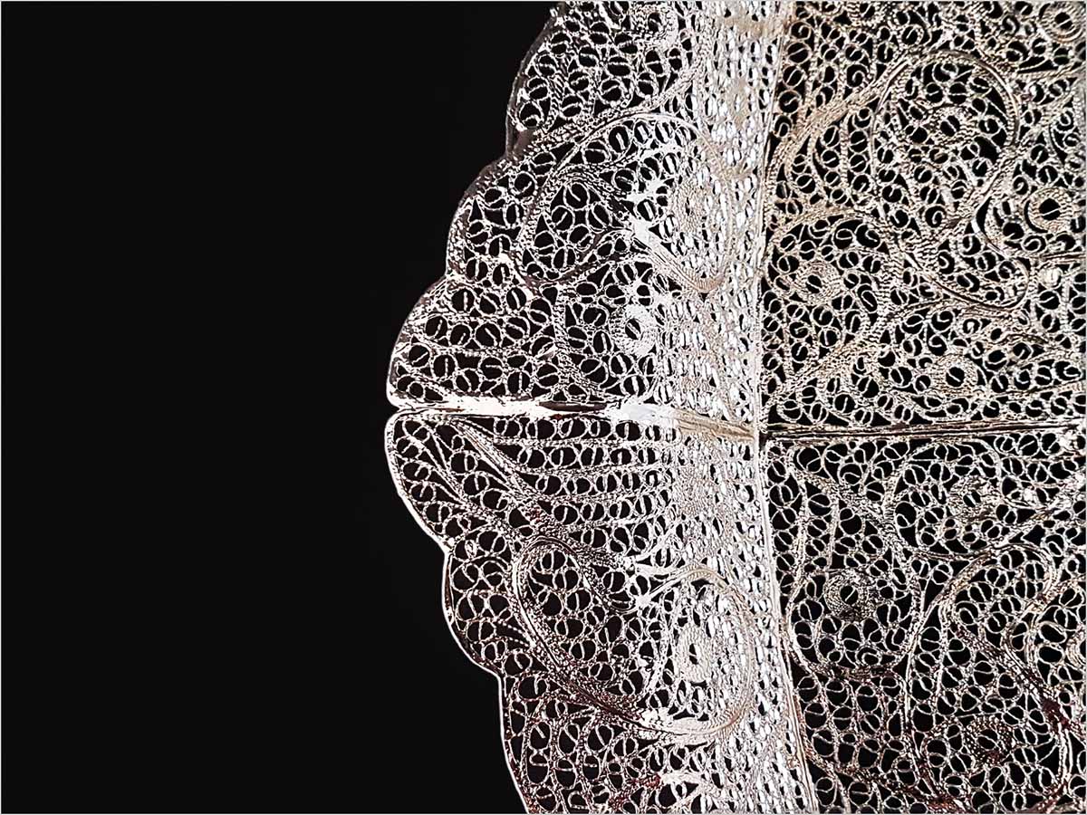 Craftestan's intricate silver-coated filigree tea tray from Isfahan