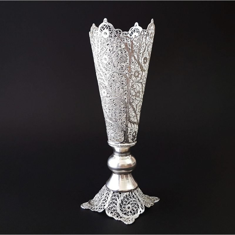 Craftestan's decorative vase showcasing intricate silver-coated filigree, embodying Isfahani elegance.