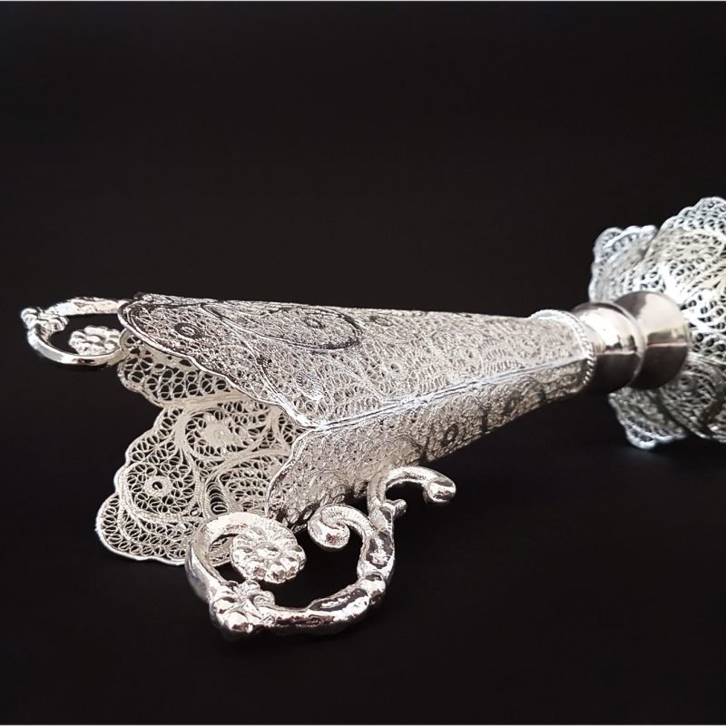Craftestan's filigree decorative vase with ornate floral handles, a symbol of Isfahani artisanal brilliance.