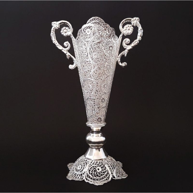 Craftestan's filigree decorative vase with ornate floral handles, a symbol of Isfahani artisanal brilliance.