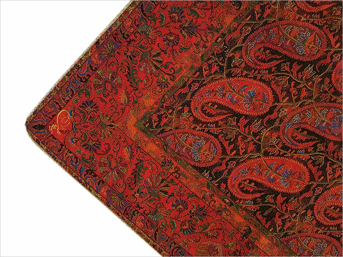 Image of Craftestan's exquisite Persian Textile Paisley Termeh tablecloth, showcasing the iconic Persian paisley design on rich crimson viscose silk.