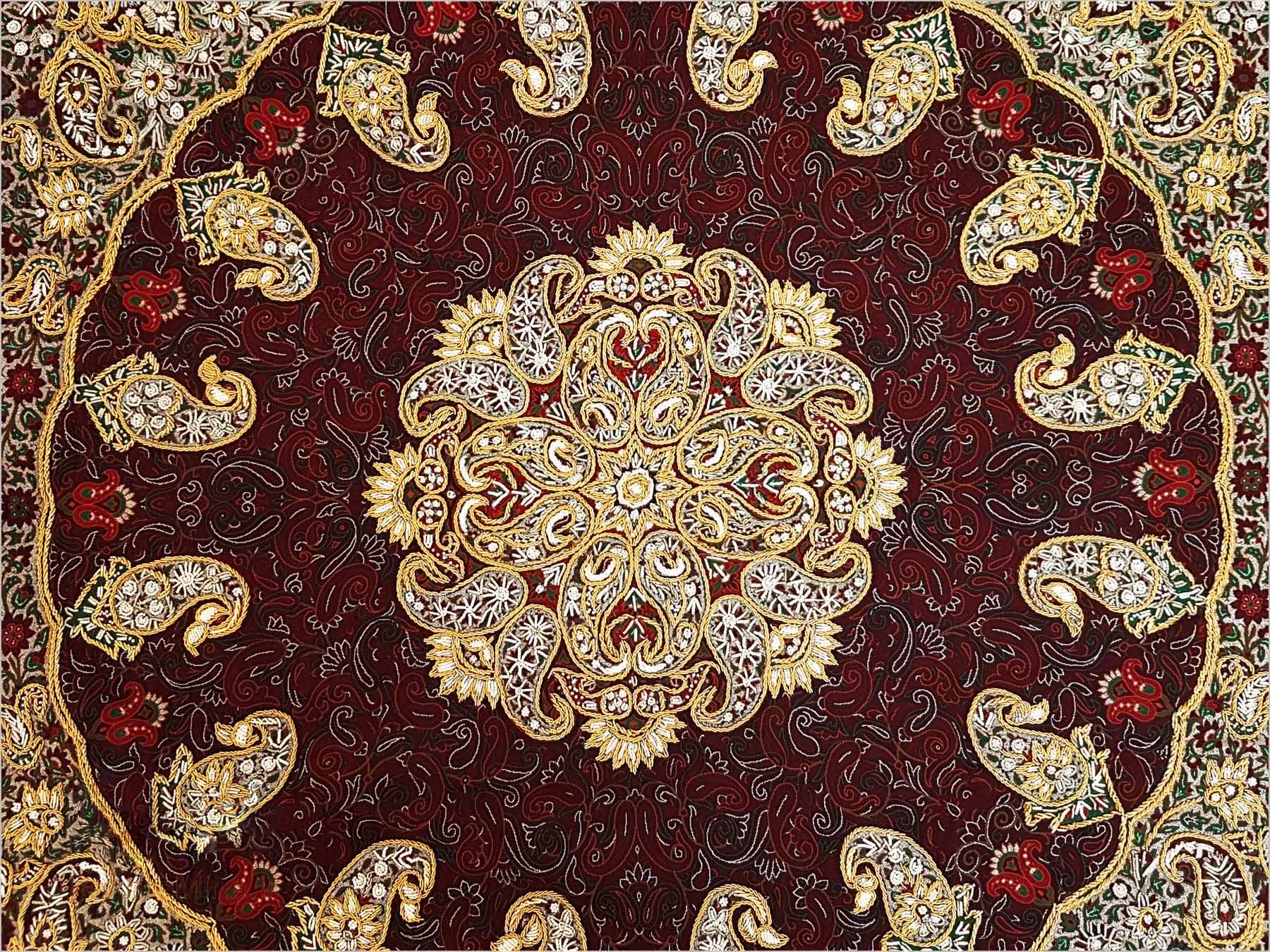 A Luxurious Persian Tablecloth Termeh set, intricately designed with crimson red and gold silk threads, accented by imitation pearls and displaying unique Hashemi patterns.