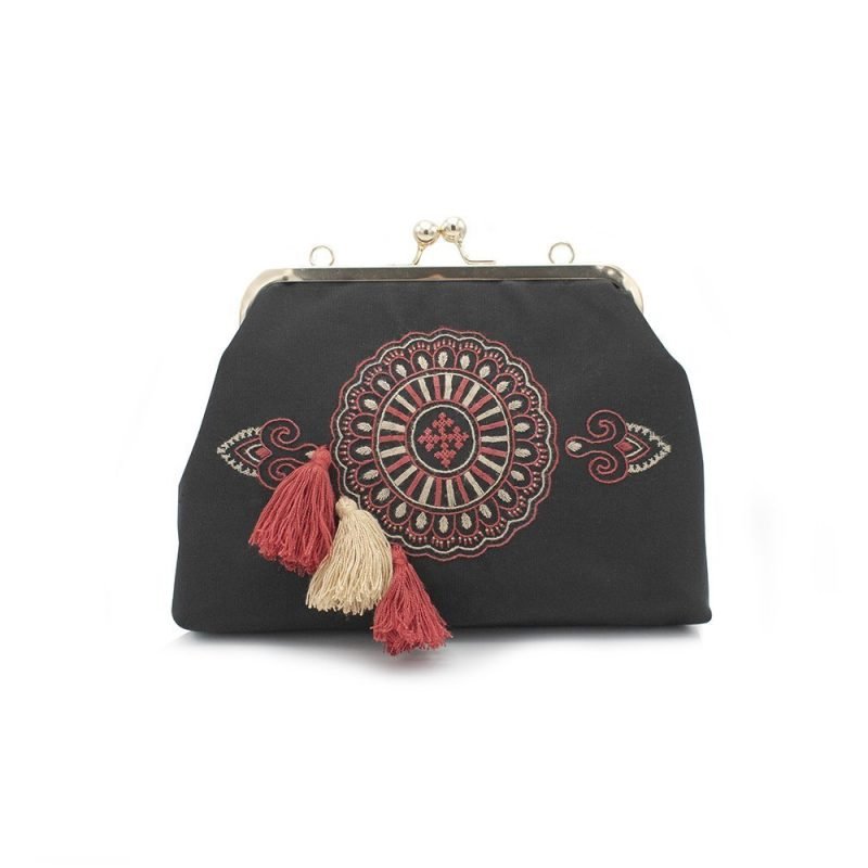 Bohemian-inspired Baluchi embroidery handbag with tassel, handcrafted by female artisans in Craftestan.