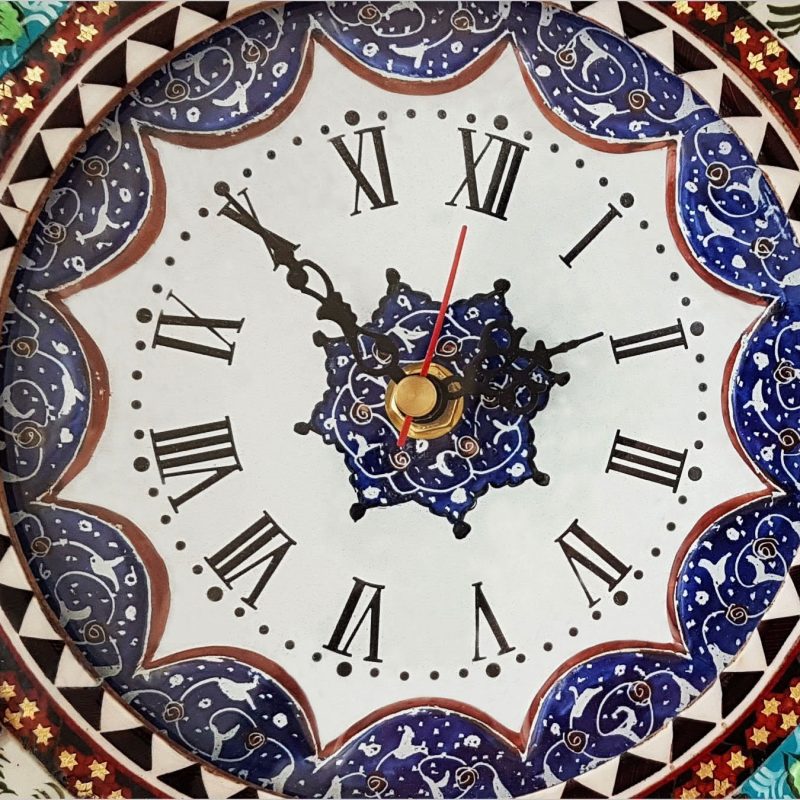 Handmade marquetry wall clock from Isfahan, representing intricate Persian geometric artistry