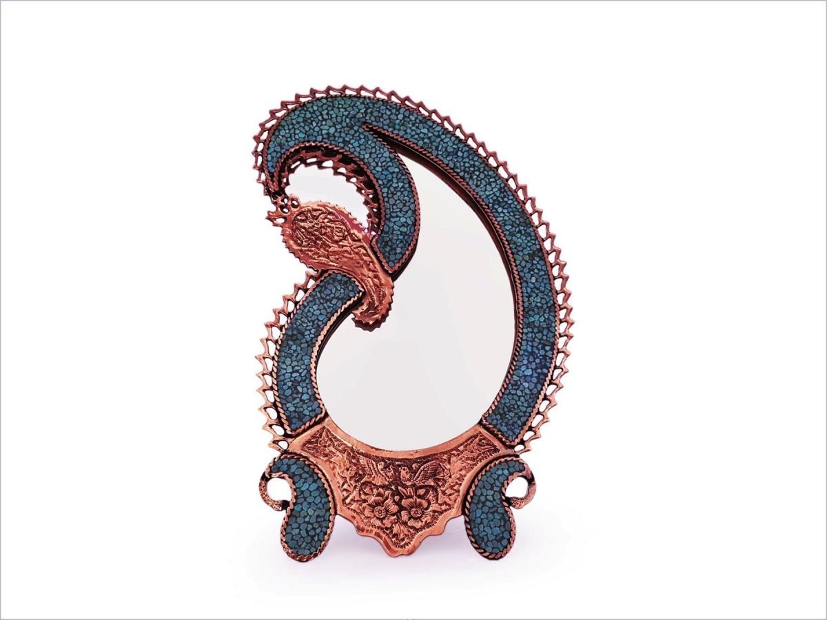 Isfahani desk mirror with 'Boteh' or paisley design, adorned with Nishapour turquoise, reflecting Persia's artistic legacy and symbolism.
