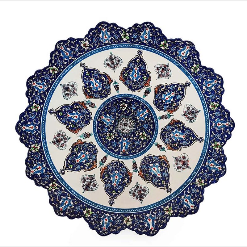 Image showcasing a 30cm diameter Persian Enamelling Decorative Plate adorned with an intricate floral and foliate design, centred around the symbolic Bergamot, a testament to the artisan craftsmanship of Isfahan.