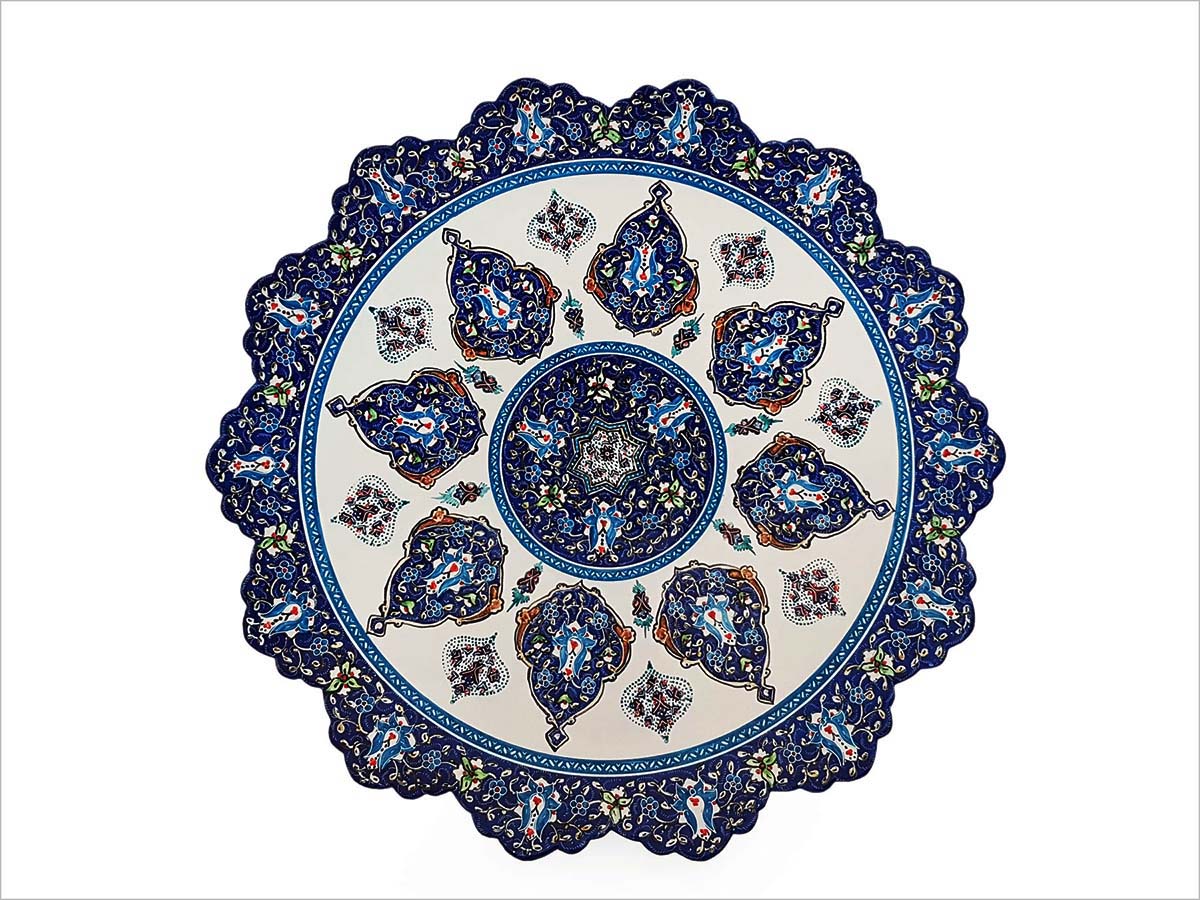 Image showcasing a 30cm diameter Persian Enamelling Decorative Plate adorned with an intricate floral and foliate design, centred around the symbolic Bergamot, a testament to the artisan craftsmanship of Isfahan.