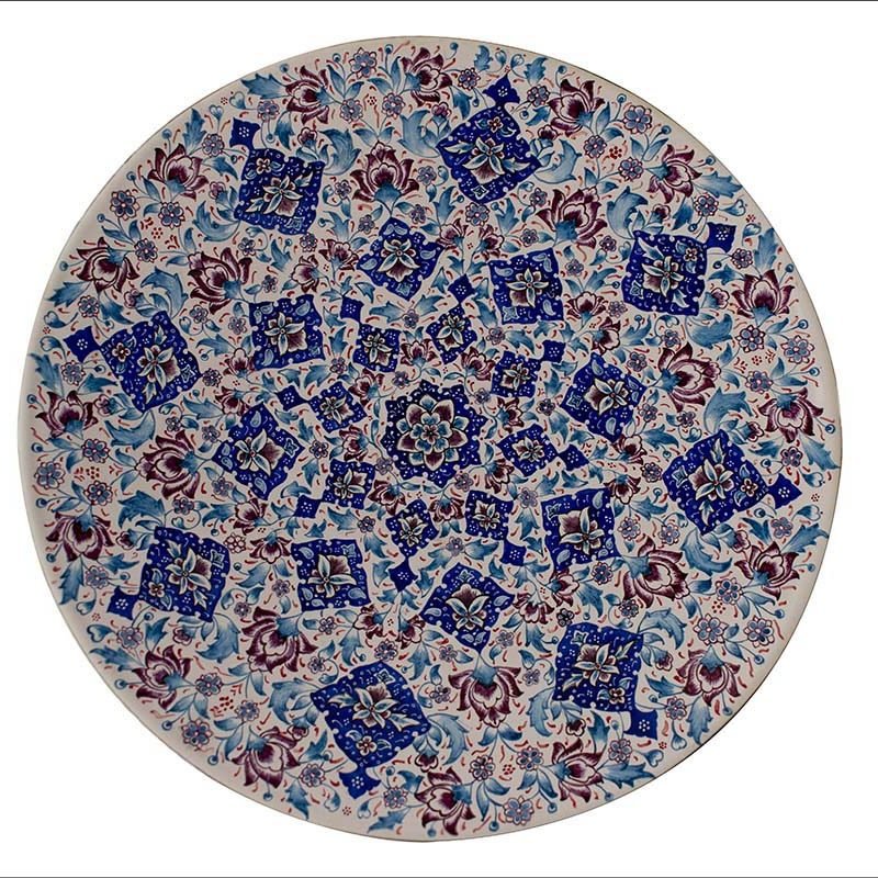 Hand-painted White Minakari Decorative Plate adorned with Persian floral and foliate patterns, echoing the grandeur of Persian craftsmanship.