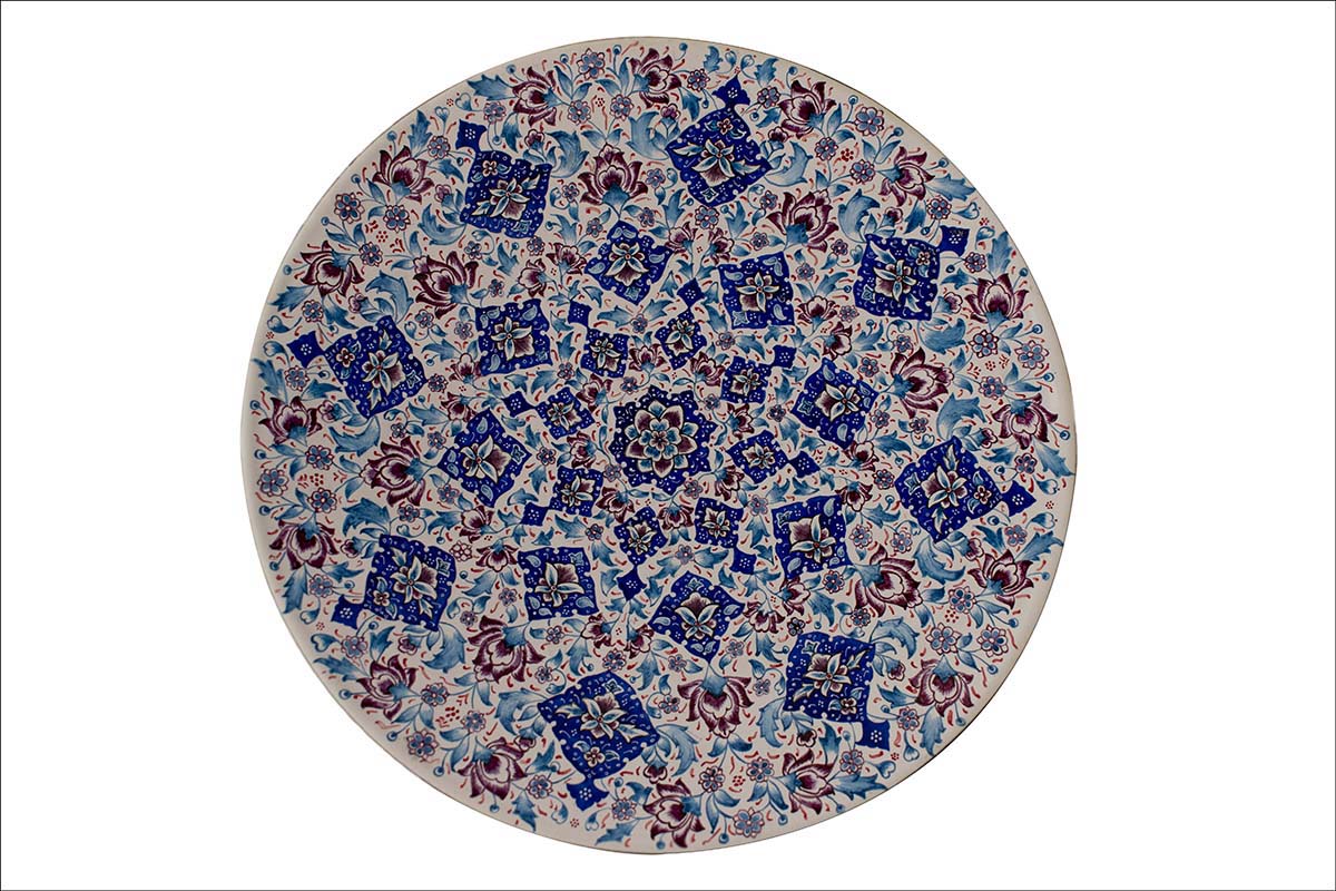 Hand-painted White Minakari Decorative Plate adorned with Persian floral and foliate patterns, echoing the grandeur of Persian craftsmanship.