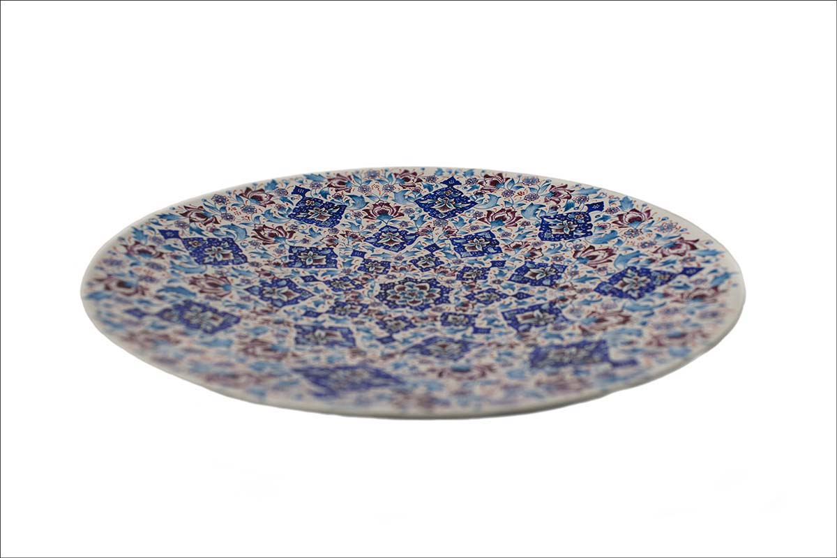 Hand-painted White Minakari Decorative Plate adorned with Persian floral and foliate patterns, echoing the grandeur of Persian craftsmanship.