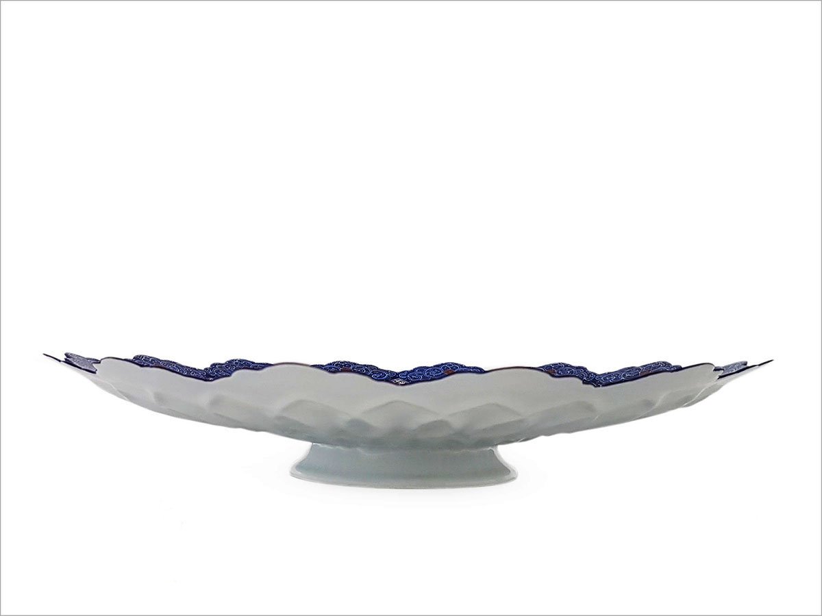 Arabesque Minakari Plate showcasing intricate geometric patterns, demonstrating the skill and dedication of Isfahan's craftsmen.