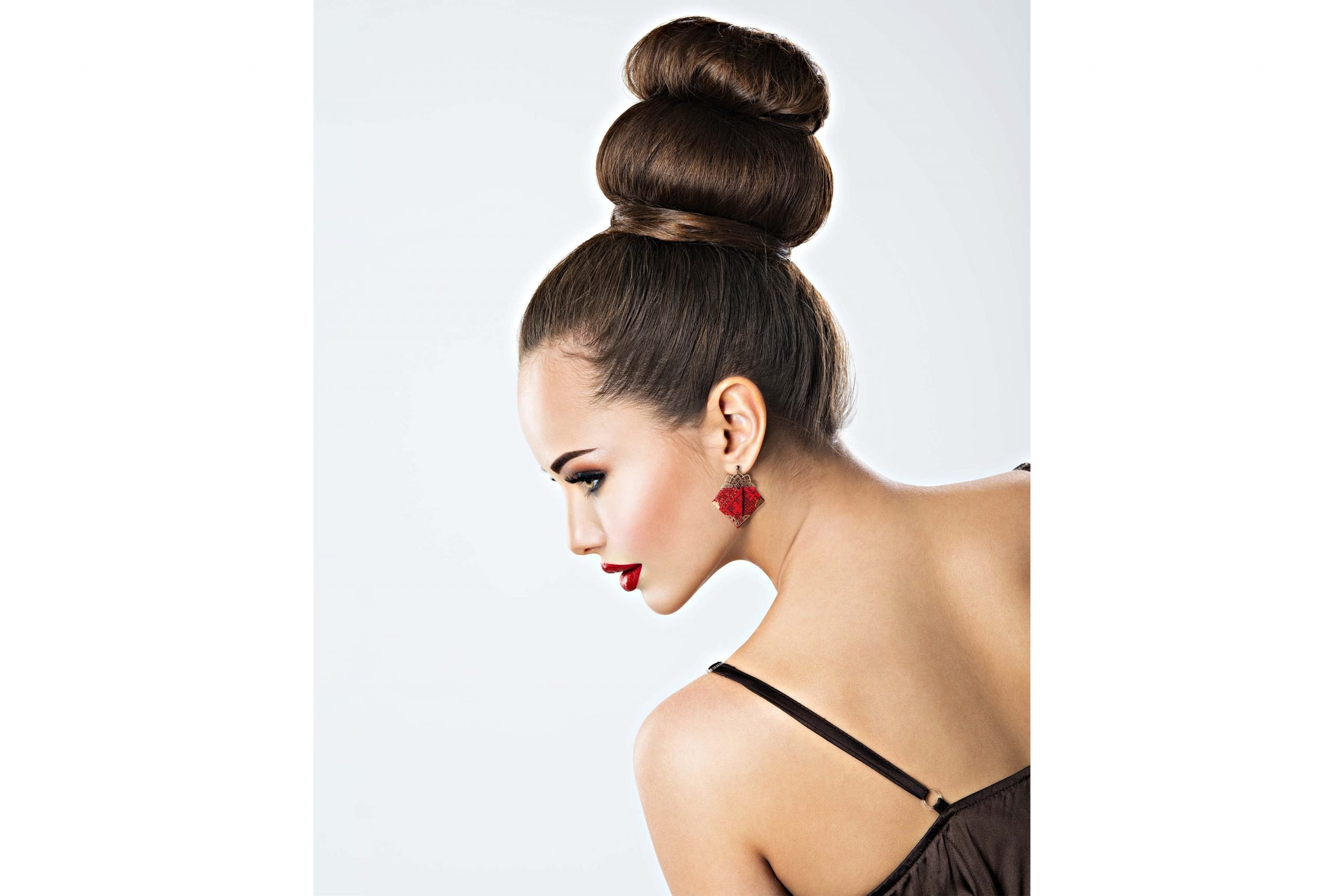 Crimson Bohemian Baluchi Accessory Set showcasing a necklace and earrings with intricate hand embroidery on a neutral background.