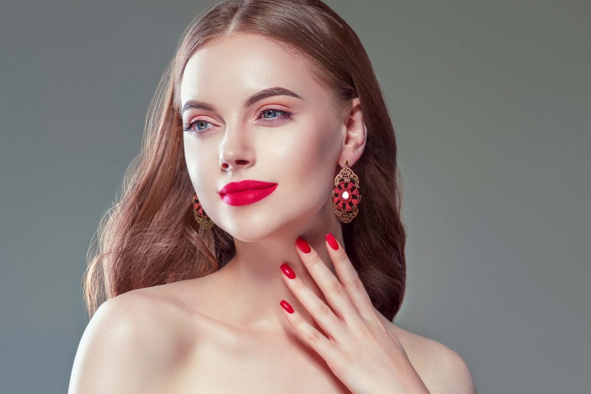 Elegant Baluchi Floral Red Accessory Set, including hand-embroidered necklace and earrings, crafted by talented Iranian women artisans.