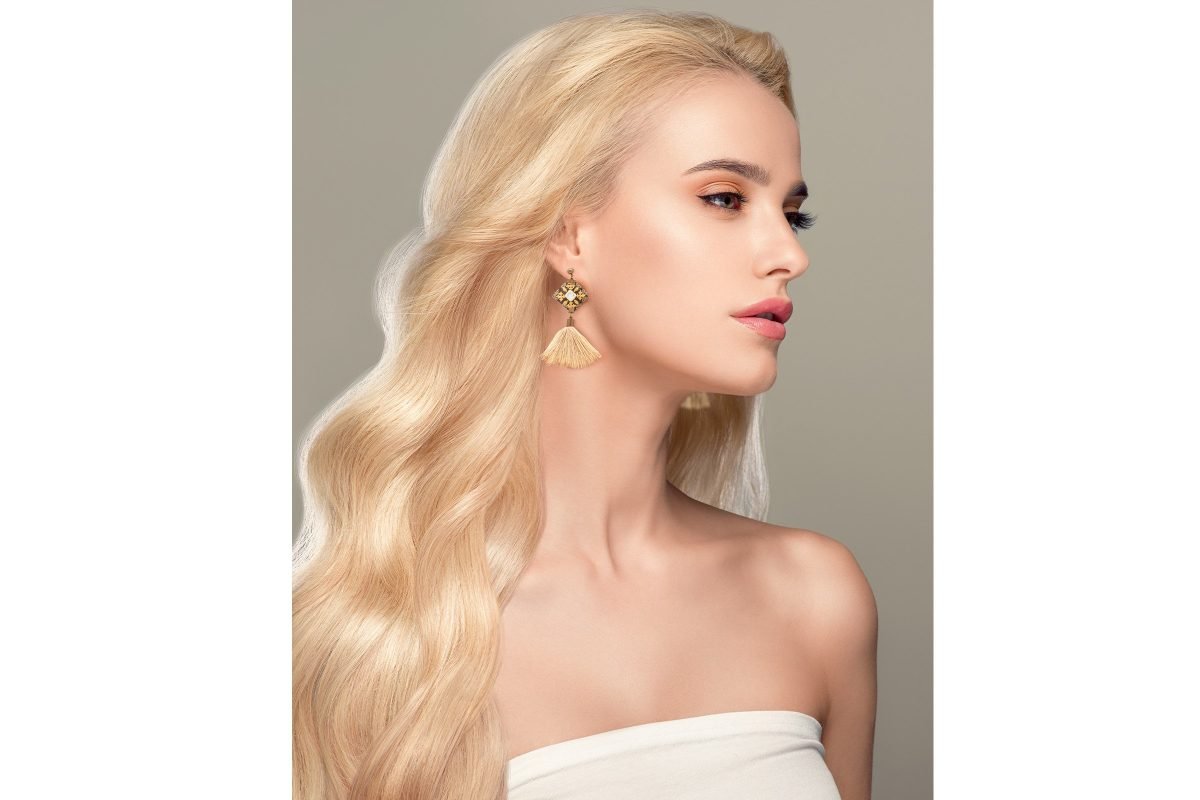 Elegant hand-embroidered Baluchi accessory set featuring a pair of earrings and a matching bracelet with intricate designs