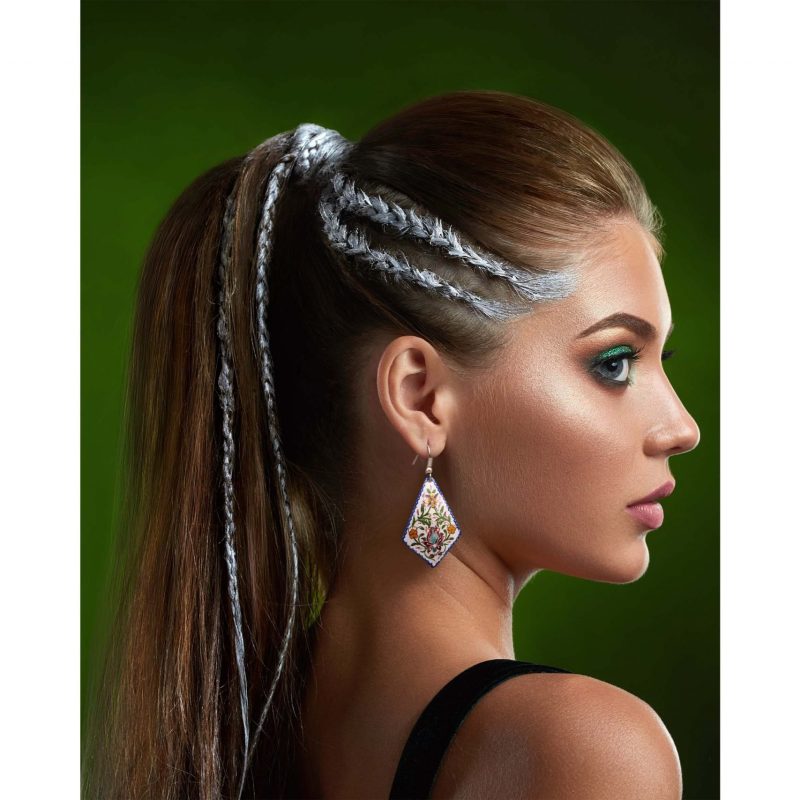 Artistic Persian Dangle Earrings on a model, made of enamelled copper and silver hooks.