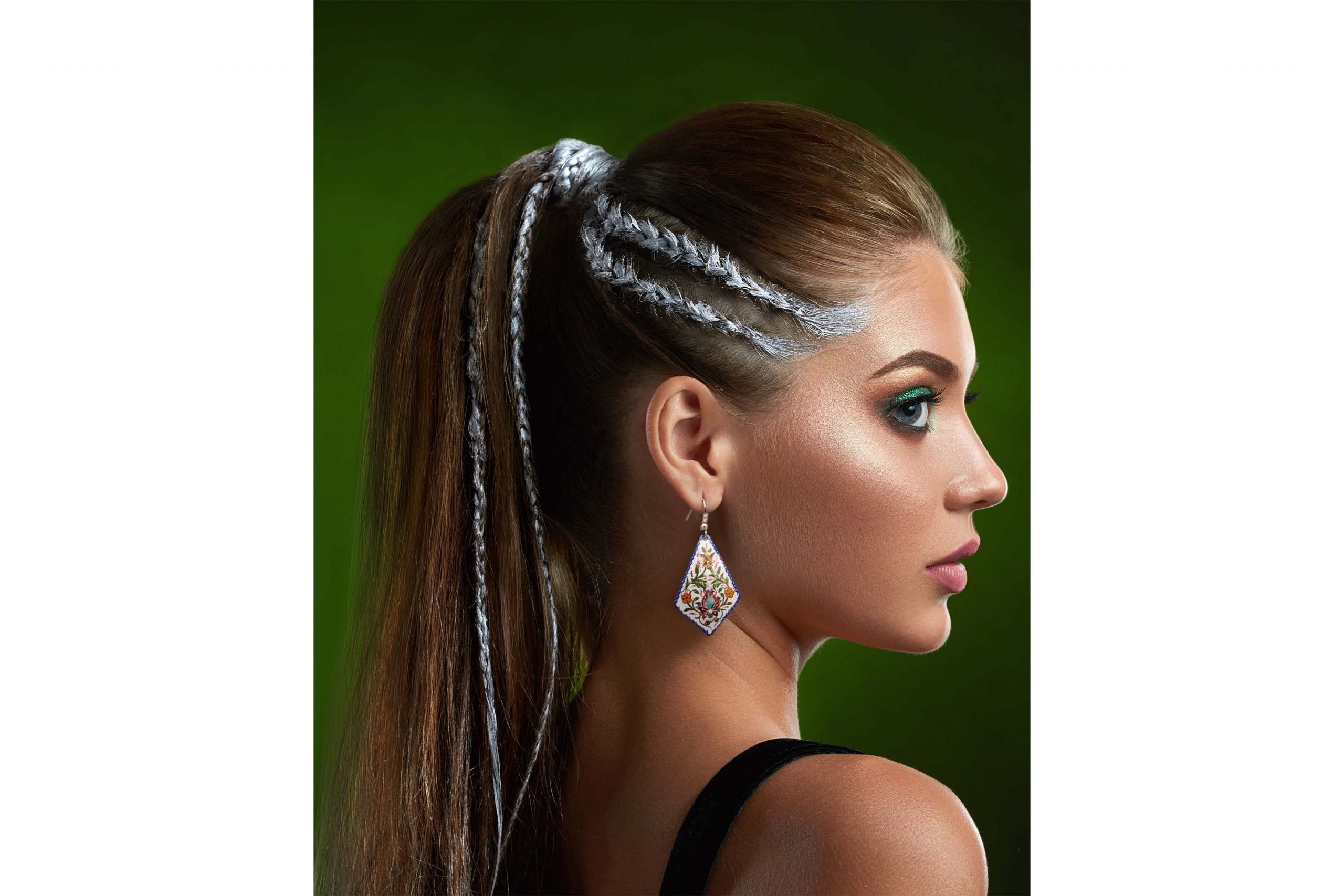 Artistic Persian Dangle Earrings on a model, made of enamelled copper and silver hooks.