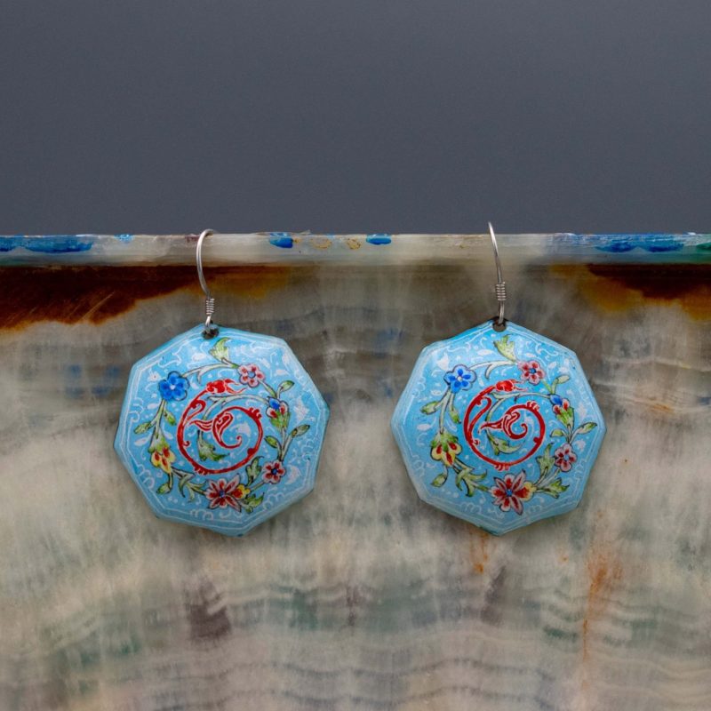 Enamel watercolour painting earrings with Persian garden design, skillfully hand-painted by a master artisan. Made of enamelled copper with titanium hooks. Each earring measures 4.5cm in height. Sky blue colour.