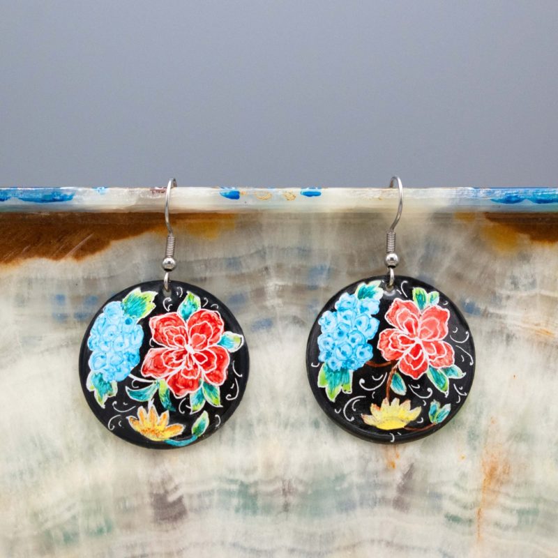 Front view of Hand-Painted Persian Enamel Watercolour Painting Earrings, featuring a unique Persian garden design in blue, red, and black hues. Made of enamelled copper with a titanium hook. Each earring measures 5cm in height and 2.5cm in width.