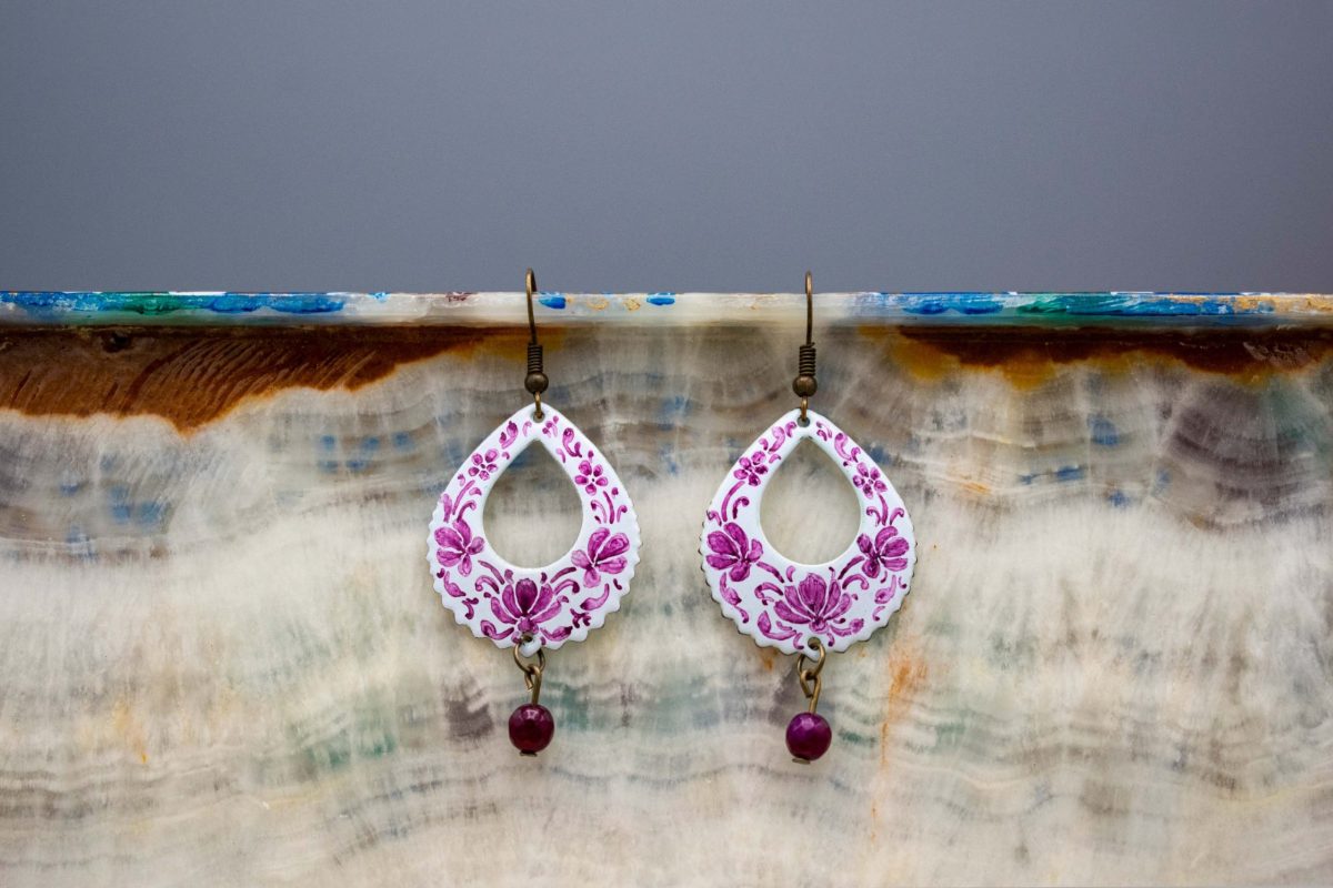 Front view of Persian Enamel Watercolour Painting Earrings, featuring enamelled copper body, hand-painted Persian pattern, and white and purple colours.