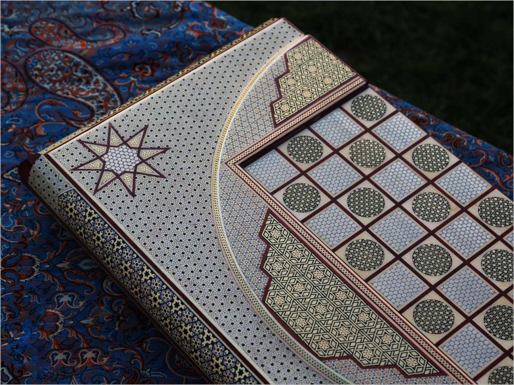 Elegant golden Persian marquetry backgammon and chess board, handcrafted with traditional techniques for the ultimate luxury gaming experience