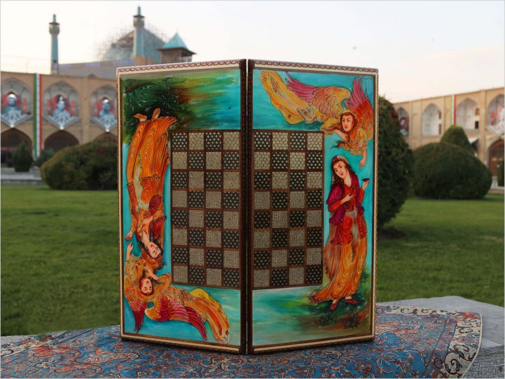 A beautiful, handcrafted Persian wooden backgammon, featuring intricate marquetry designs with a legendary scene of female Persian angles and a charming courting scene on both the outside and inside. Rich colours of crimson, green, blue, brown, and yellow bring the designs to life. Perfect for game rooms or collections. History of Board Games