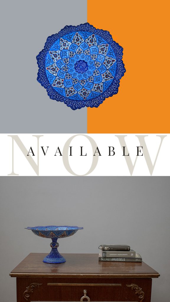 A hand-painted Persian enamel stem bowl with vibrant blue, green, and pink floral and foliate designs on a smooth and lustrous enamel glaze. The intricate details and vibrant colours make it a mesmerising and timeless masterpiece of traditional artistry.