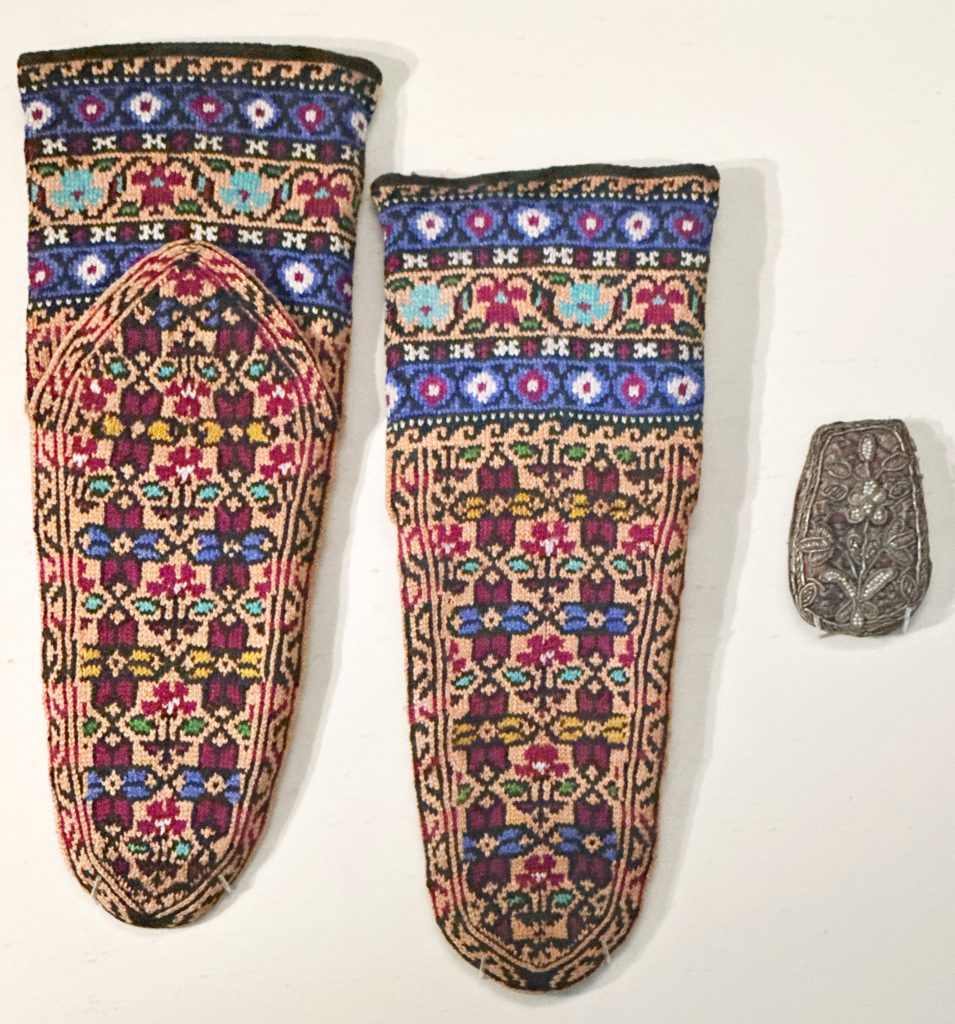 Colorful silk socks with intricate patterns, showcasing Persian craftsmanship and cultural traditions. Persian fashion history