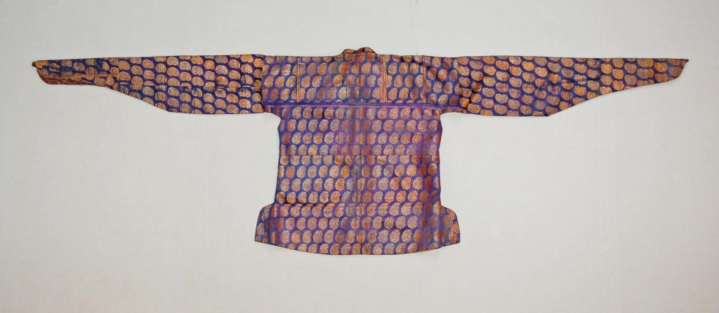 Traditional Iranian Isfahani brocade jacket with lion and sun motifs in golden silk on purple satin. Persian fashion history 