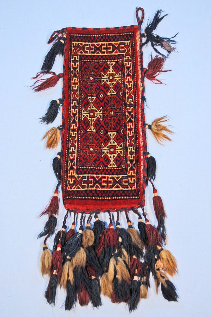 Spindle bag made of durable cloth, crafted by Turkmen artisans from the Ataby and Yomut tribes. Persian fashion history