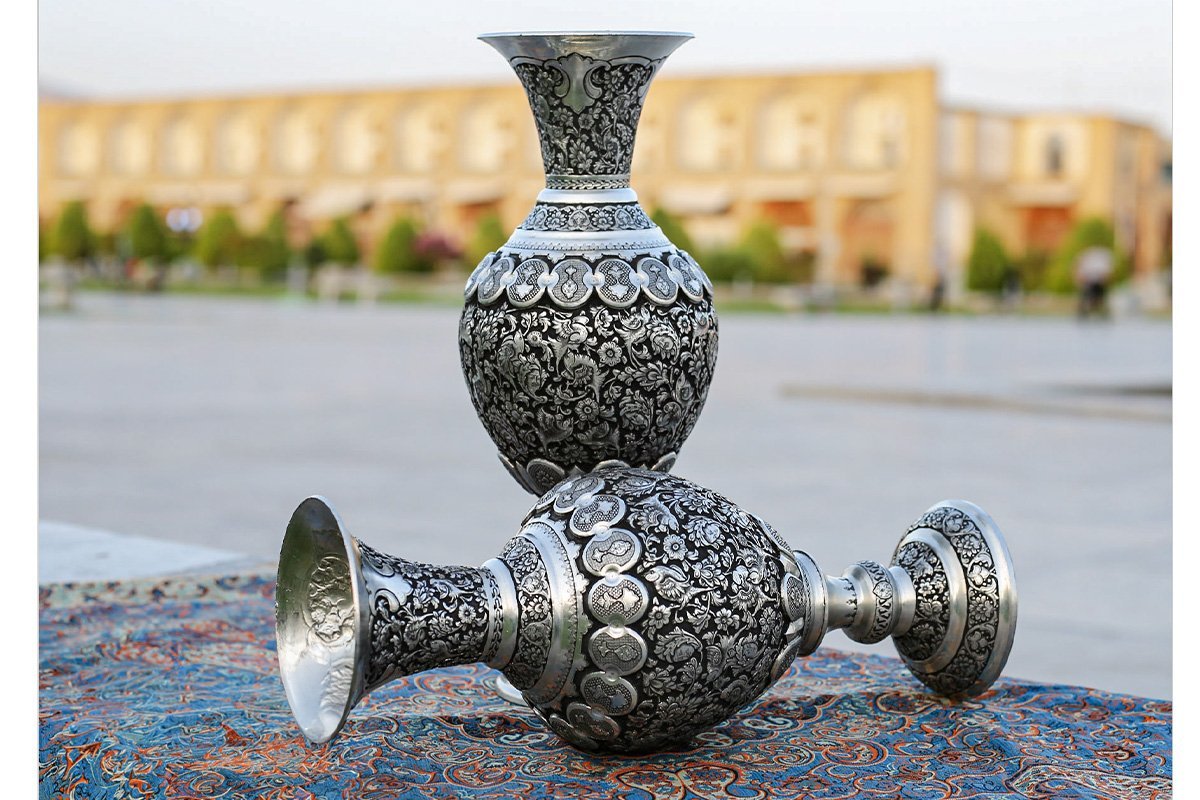 Pair of 40cm Persian Toreutics Vases featuring intricate Ghalam Zani engravings of Tulip design, birds, and human faces against a striking silver-black backdrop