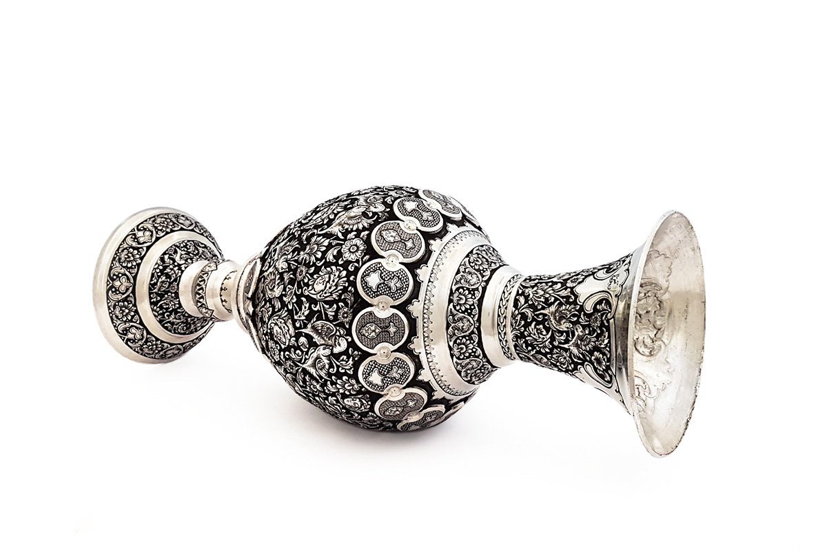 Pair of 40cm Persian Toreutics Vases featuring intricate Ghalam Zani engravings of Tulip design, birds, and human faces against a striking silver-black backdrop
