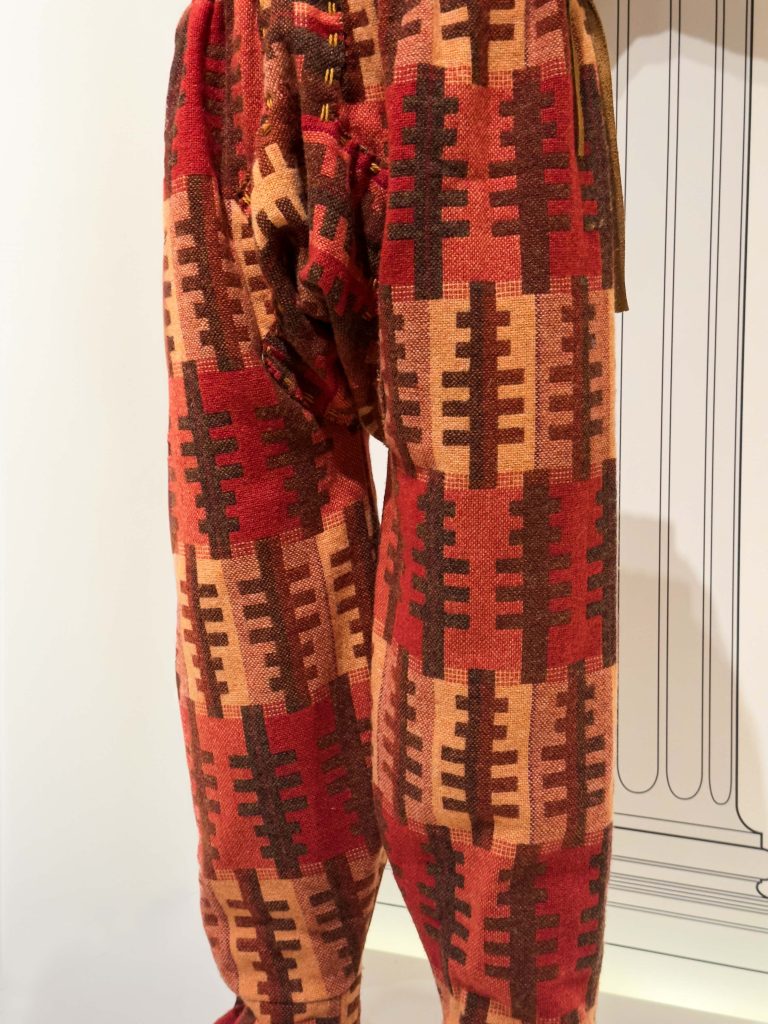 Authentically reconstructed Achaemenid riding costume by Lloyd Llewellyn-Jones and Rebecca Southall, adorned with metallic appliqués and crafted with lamb's wool and faux fur, reflecting the sophistication and sartorial traditions of ancient Persia.