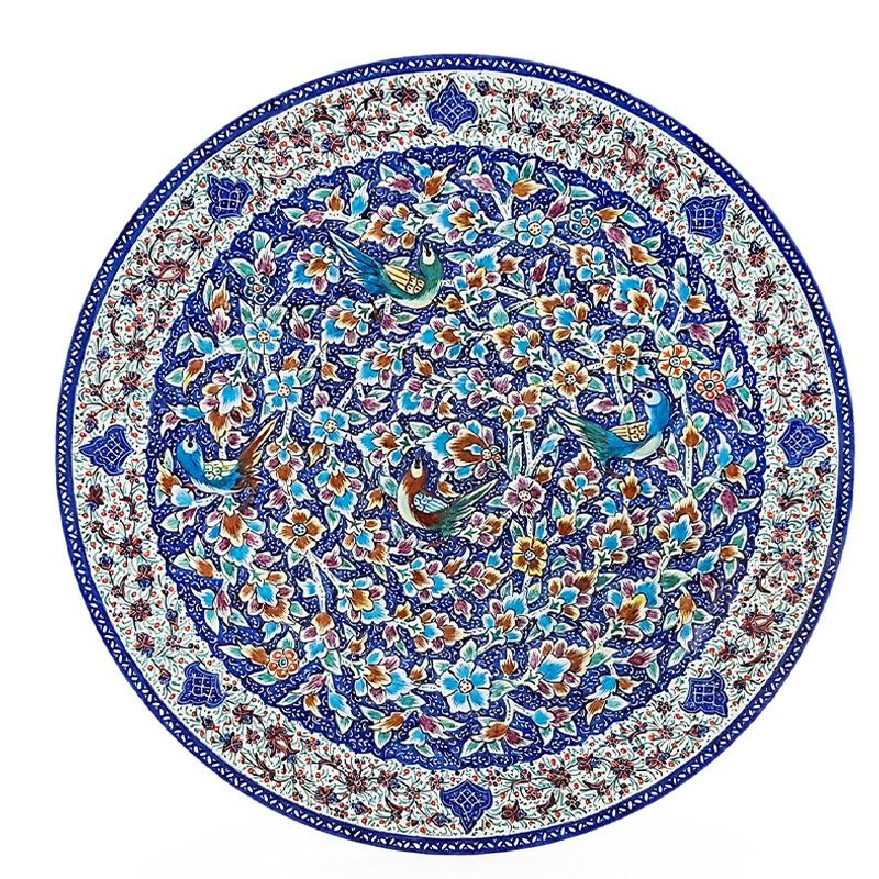 A Hand-crafted Persian Enamelled Plate by Craftestan, with a vibrant design of nightingales and flowers, reflective of Persian culture.