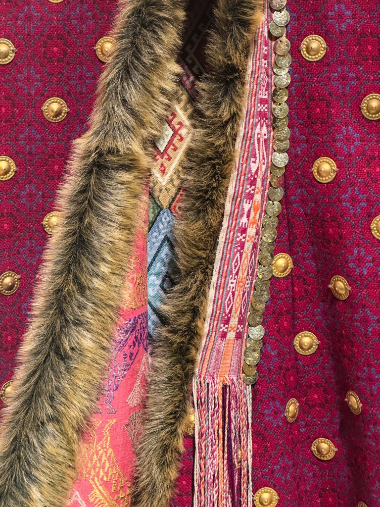 Authentically reconstructed Achaemenid riding costume by Lloyd Llewellyn-Jones and Rebecca Southall, adorned with metallic appliqués and crafted with lamb's wool and faux fur, reflecting the sophistication and sartorial traditions of ancient Persia.