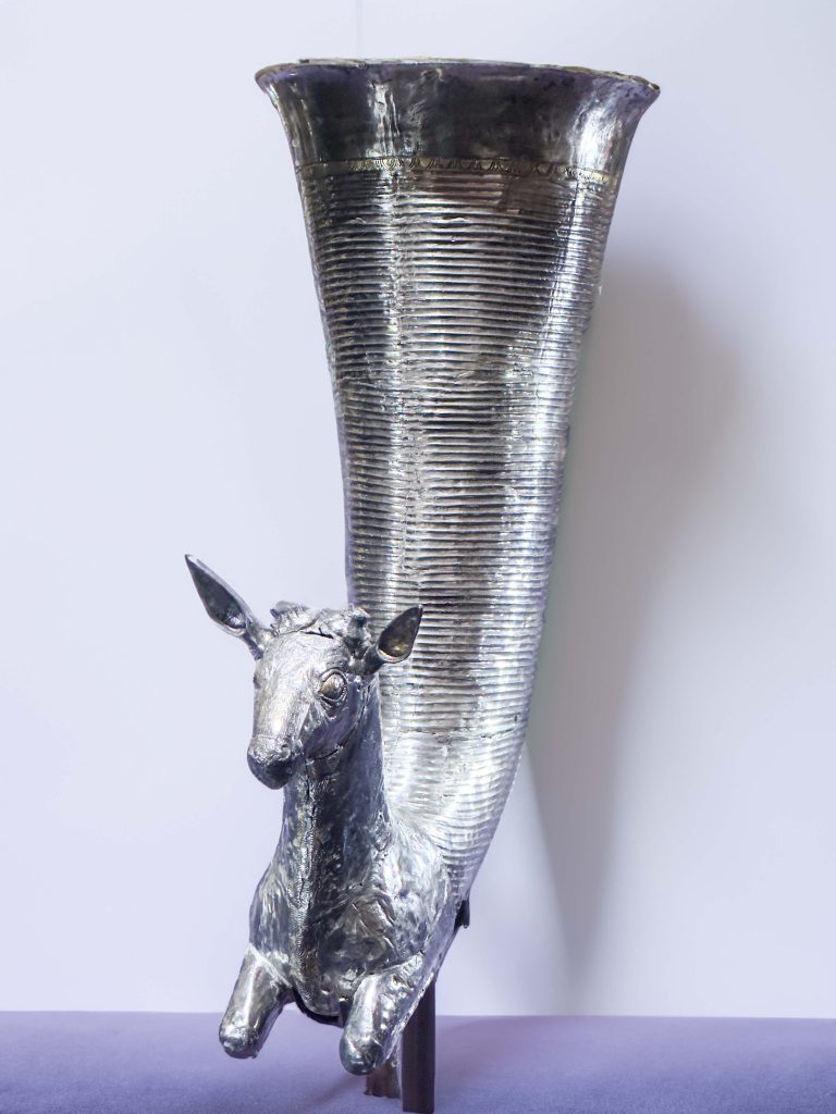 A meticulously crafted silver Gazelle Drinking Horn from the Achaemenid era, adorned with the detailed and elegant features of a gazelle, symbolizing the refined taste and luxurious lifestyles of ancient Persia.