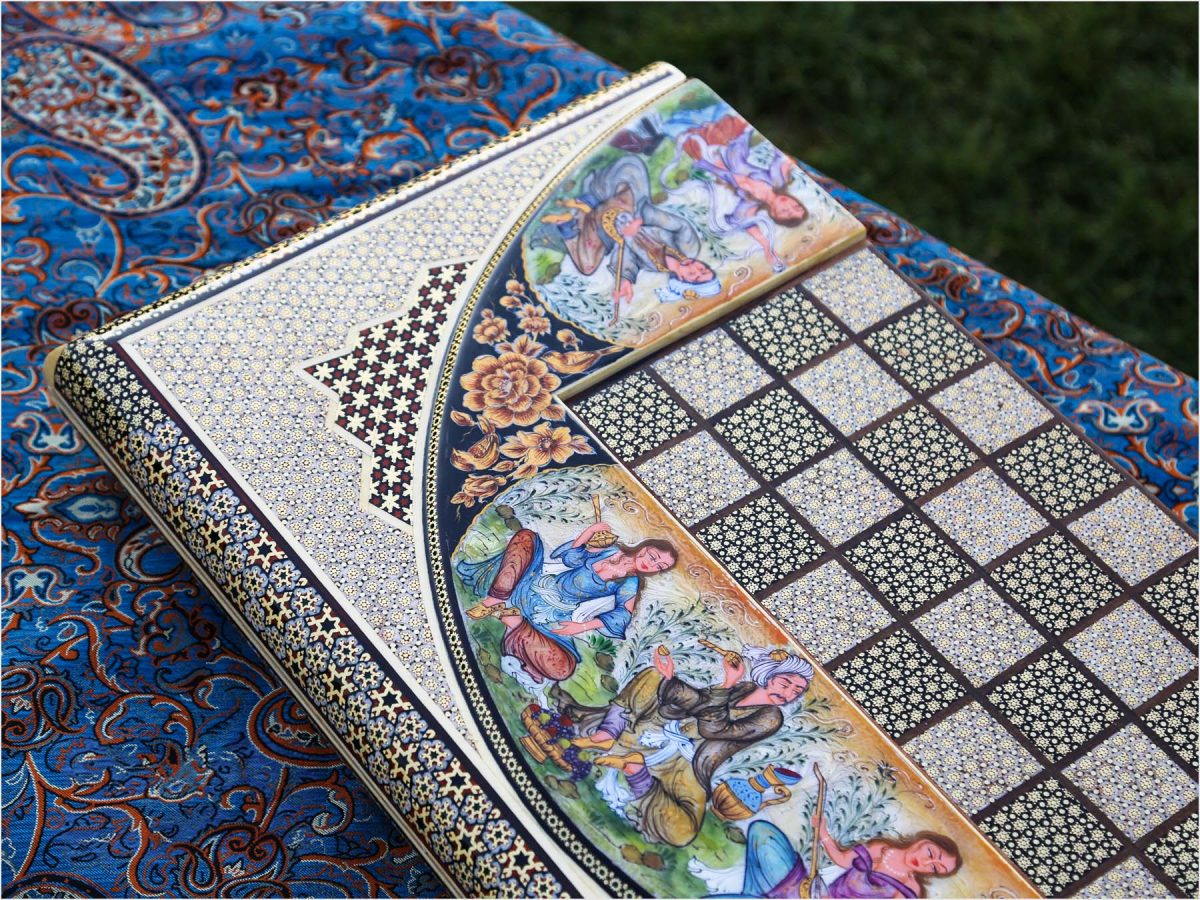 Exquisite wooden backgammon featuring Persian Khatam Kari design with Bazm-themed artwork.