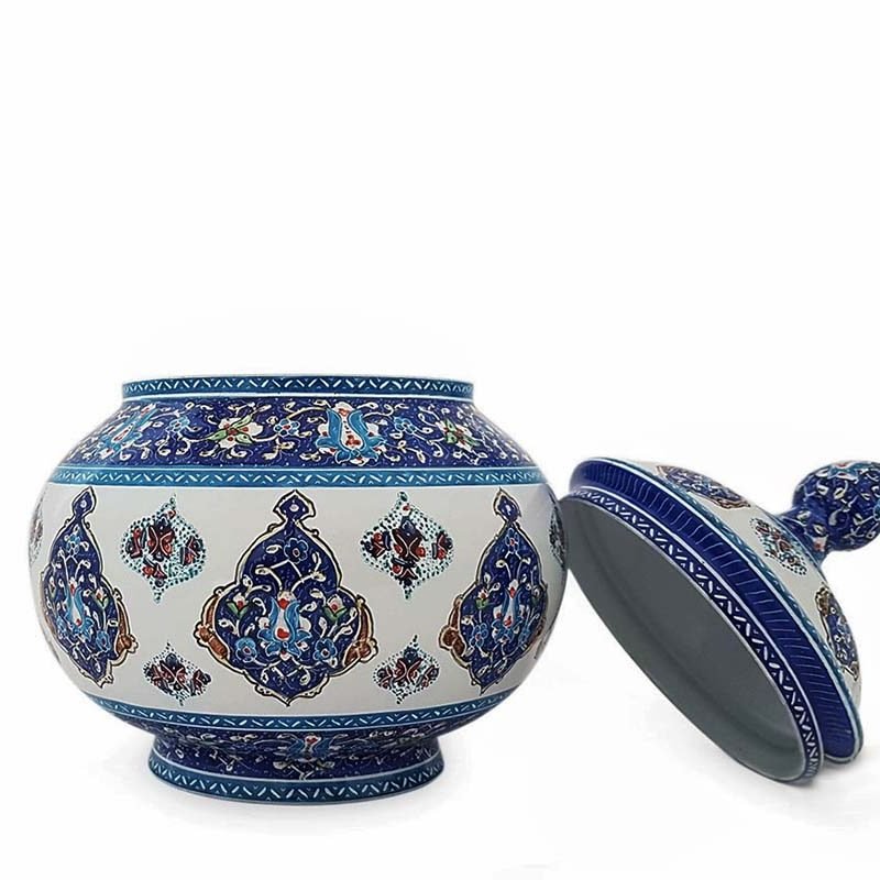 Finely-crafted enamelled candy jar with intricate Toranj motifs, encapsulating the rich Minakari tradition of Isfahan and Persian cultural tales.