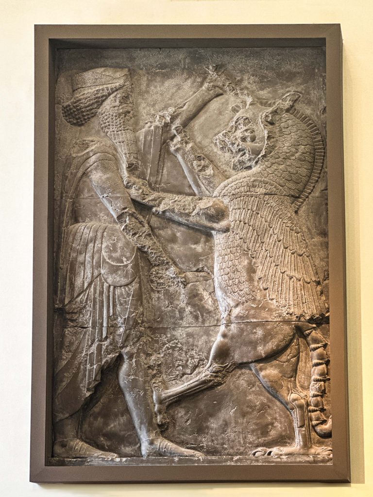 Close-up of combat carvings from Persian Empire Doorways in the Palace of Xerxes, highlighting the heroism and tales of the Achaemenid era.