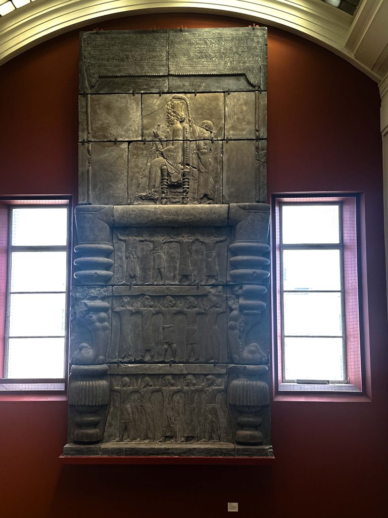 Detailed reliefs of the Persian Empire Doorways from Persepolis, showcasing the Achaemenid king, symbols, and various cultural representatives.