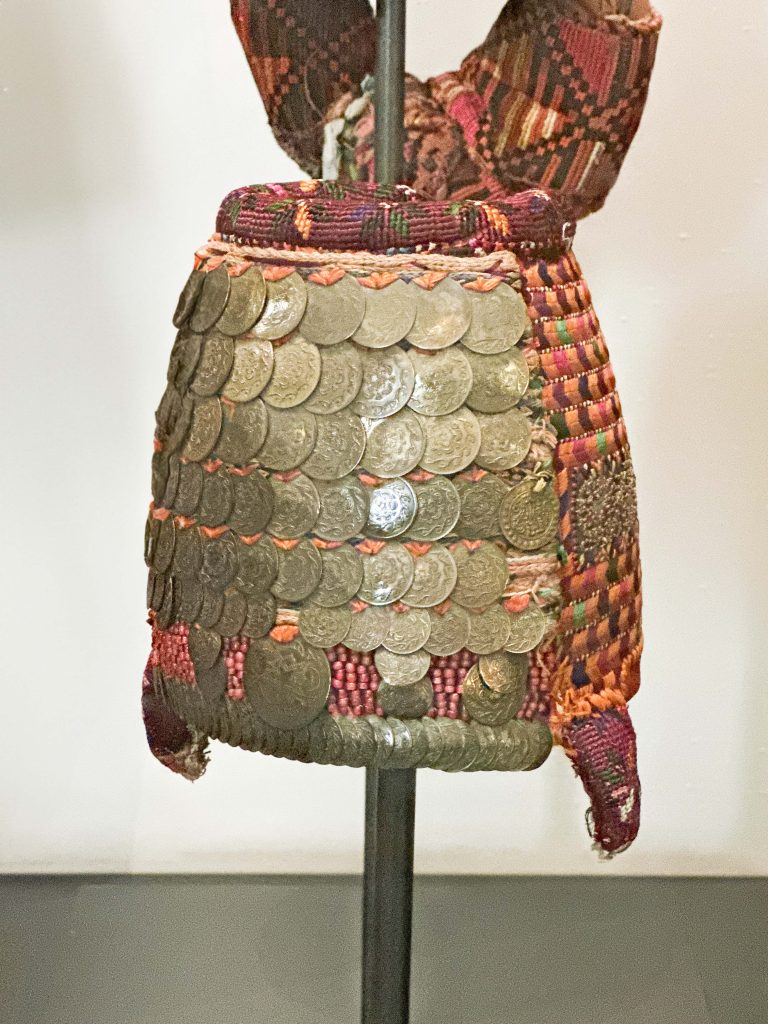 Married village woman's head-dress (shatweh) made of red broadcloth. Arabian clothing