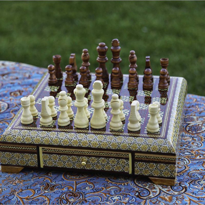 Handcrafted Persian chessboard with Khatam-Kari inlay from Isfahan, made of beech wood with a sliding drawer for piece storage, measuring 27 cm x 27 cm.