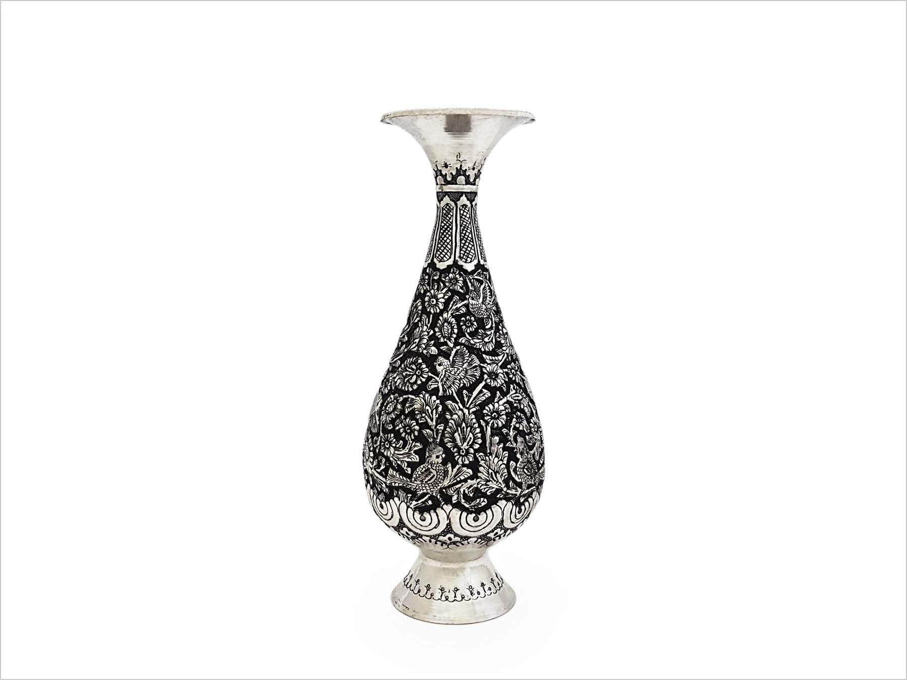 Handcrafted Persian Toreutics vase with floral engravings, made from copper and finished with tin and carbonic detailing. 25 cm height.
