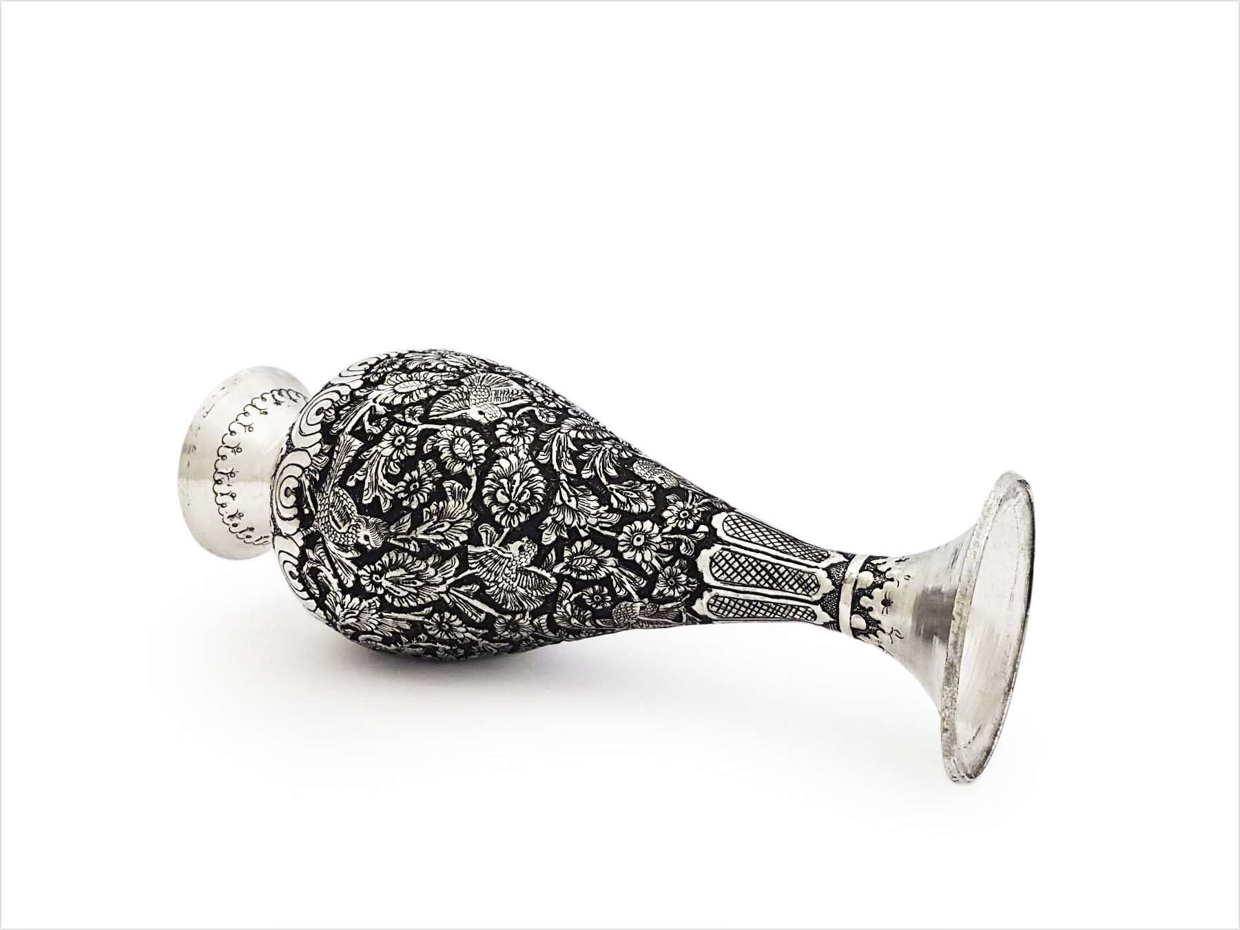Handcrafted Persian Toreutics vase with floral engravings, made from copper and finished with tin and carbonic detailing. 25 cm height.